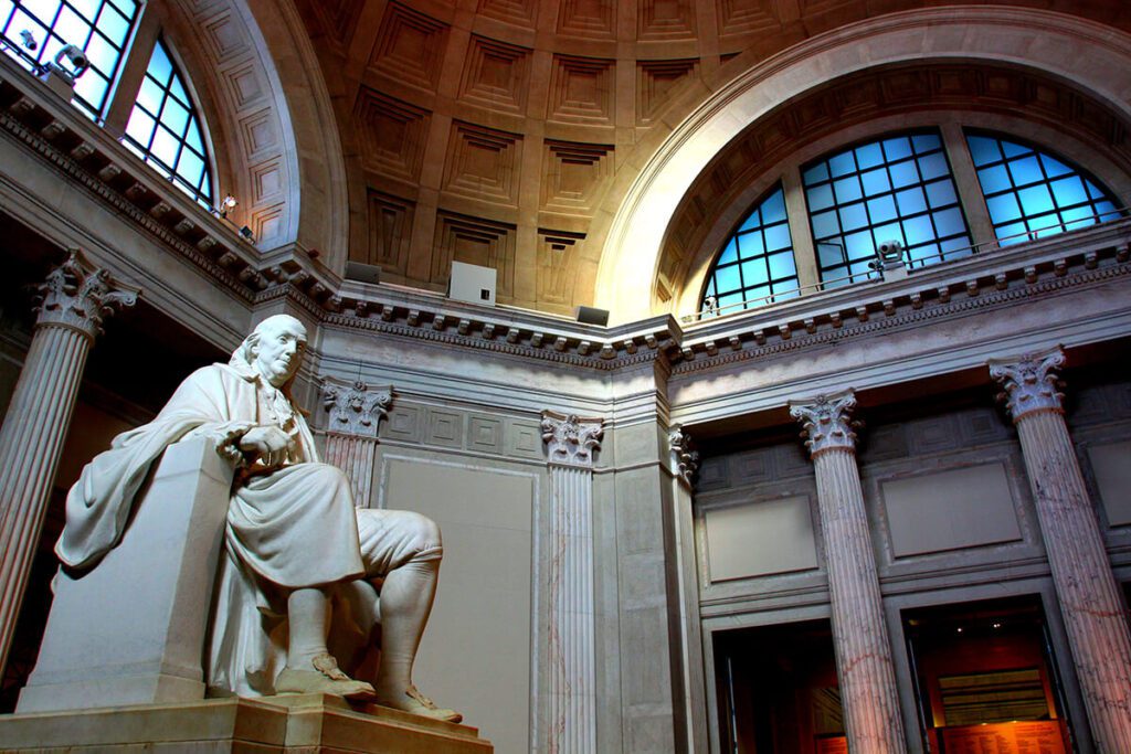 Inside the Franklin Institute with a Bren Franklin Statue