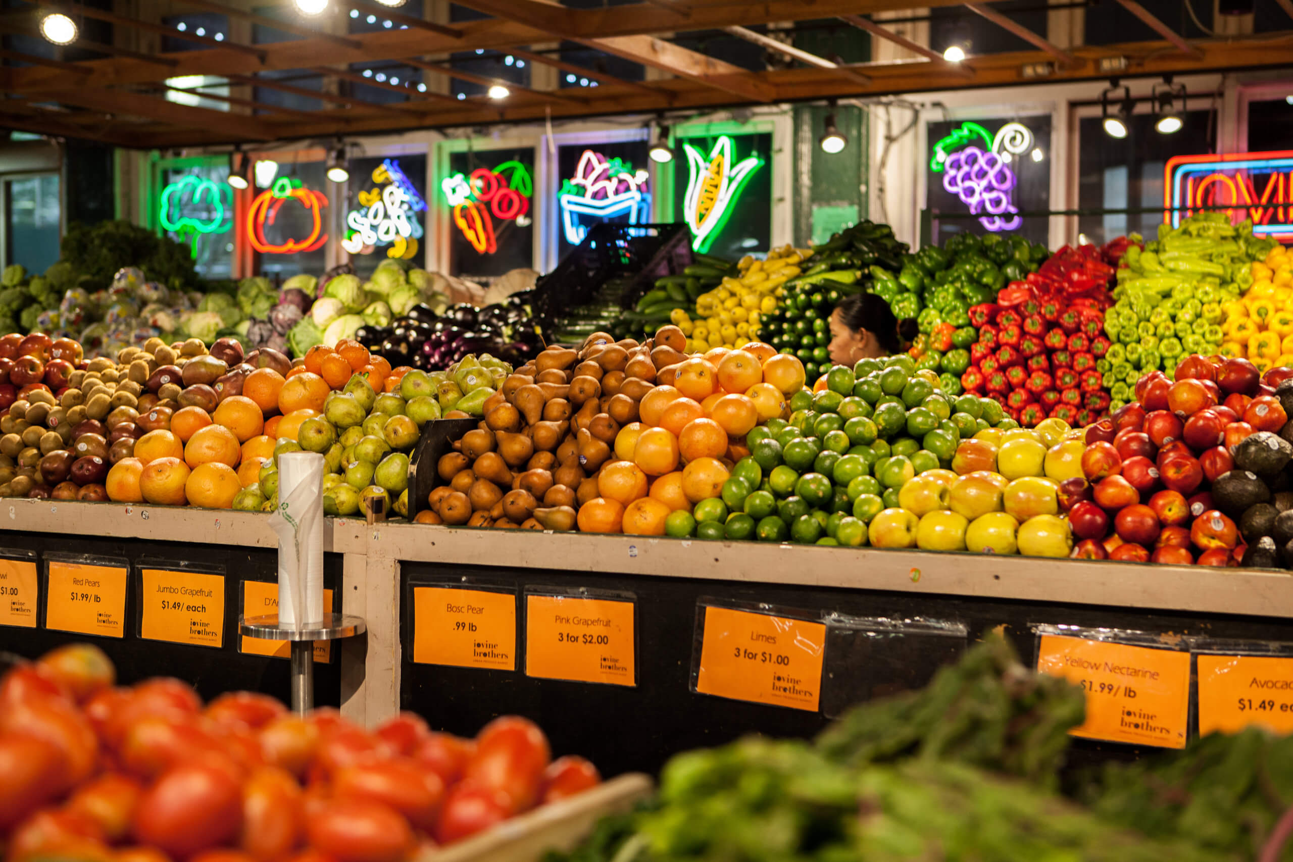 An isle in a market full of fruit.