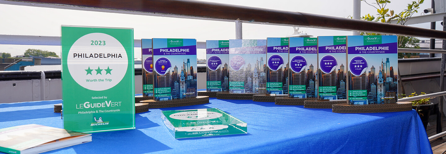 The French Michelin Green Guide displayed on a table top.