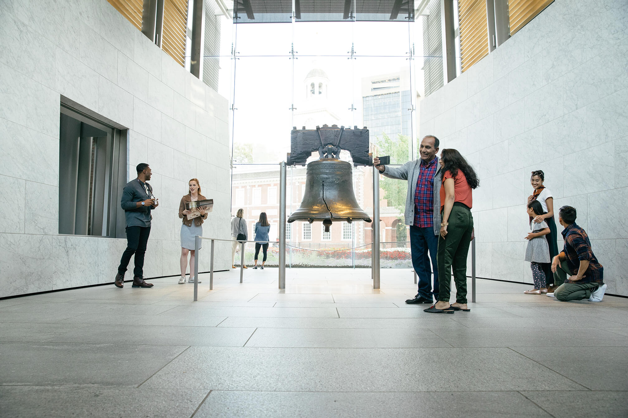 A group touring the Liberty Bell in Philadelphia.