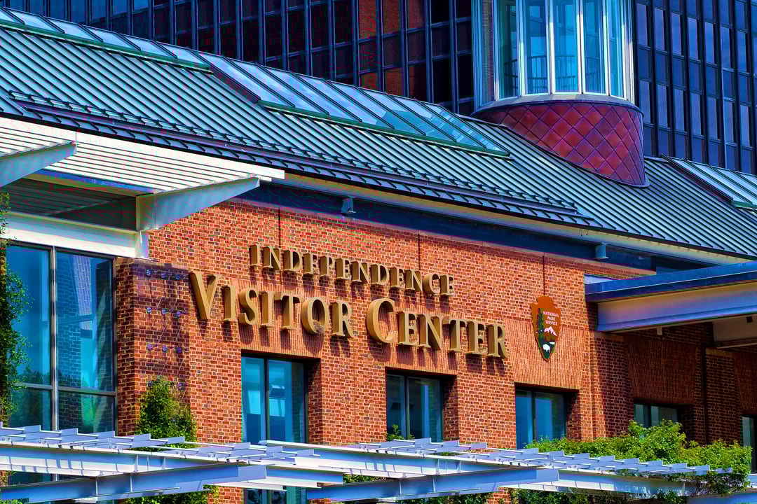 Exterior of a brick building with the name