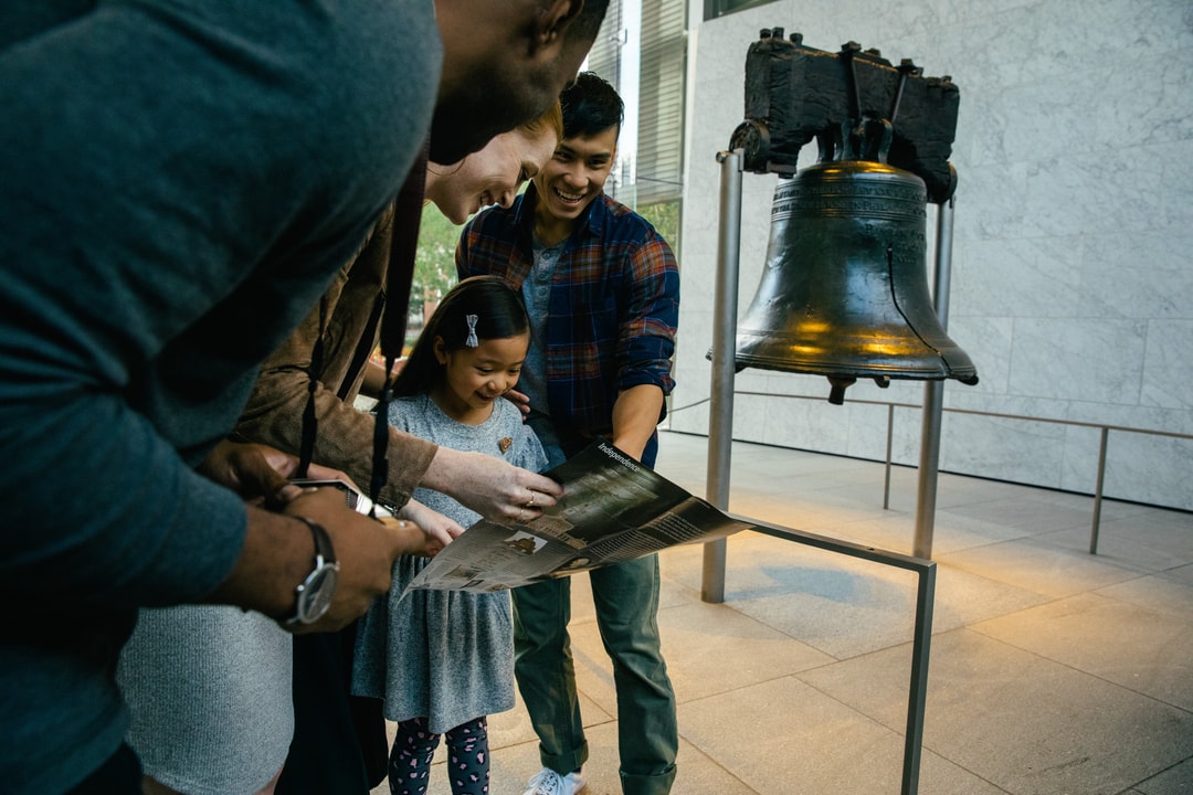 A group of people at the Liberty Bell in Philadelphia.