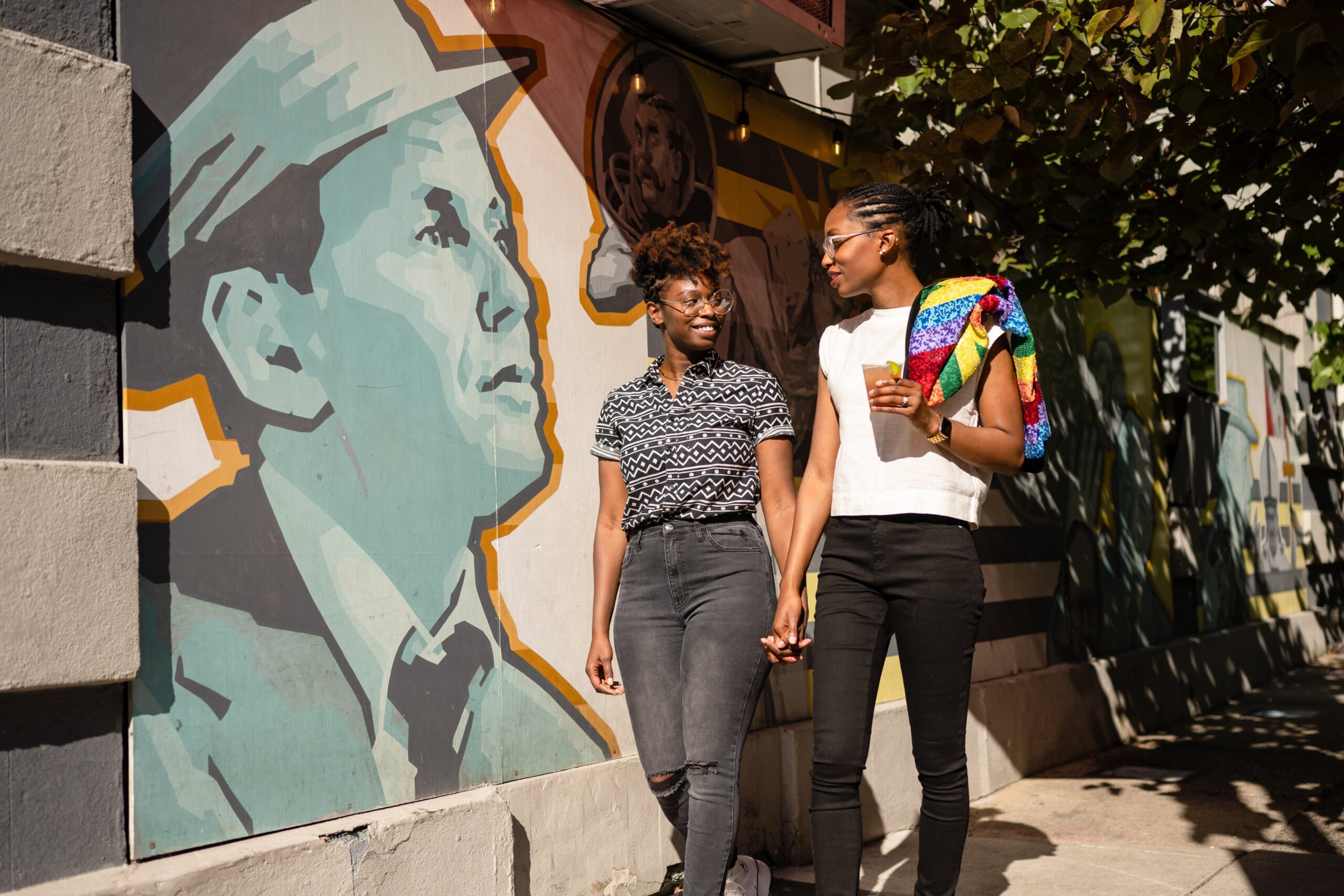 Two people walking in Philadelphia.