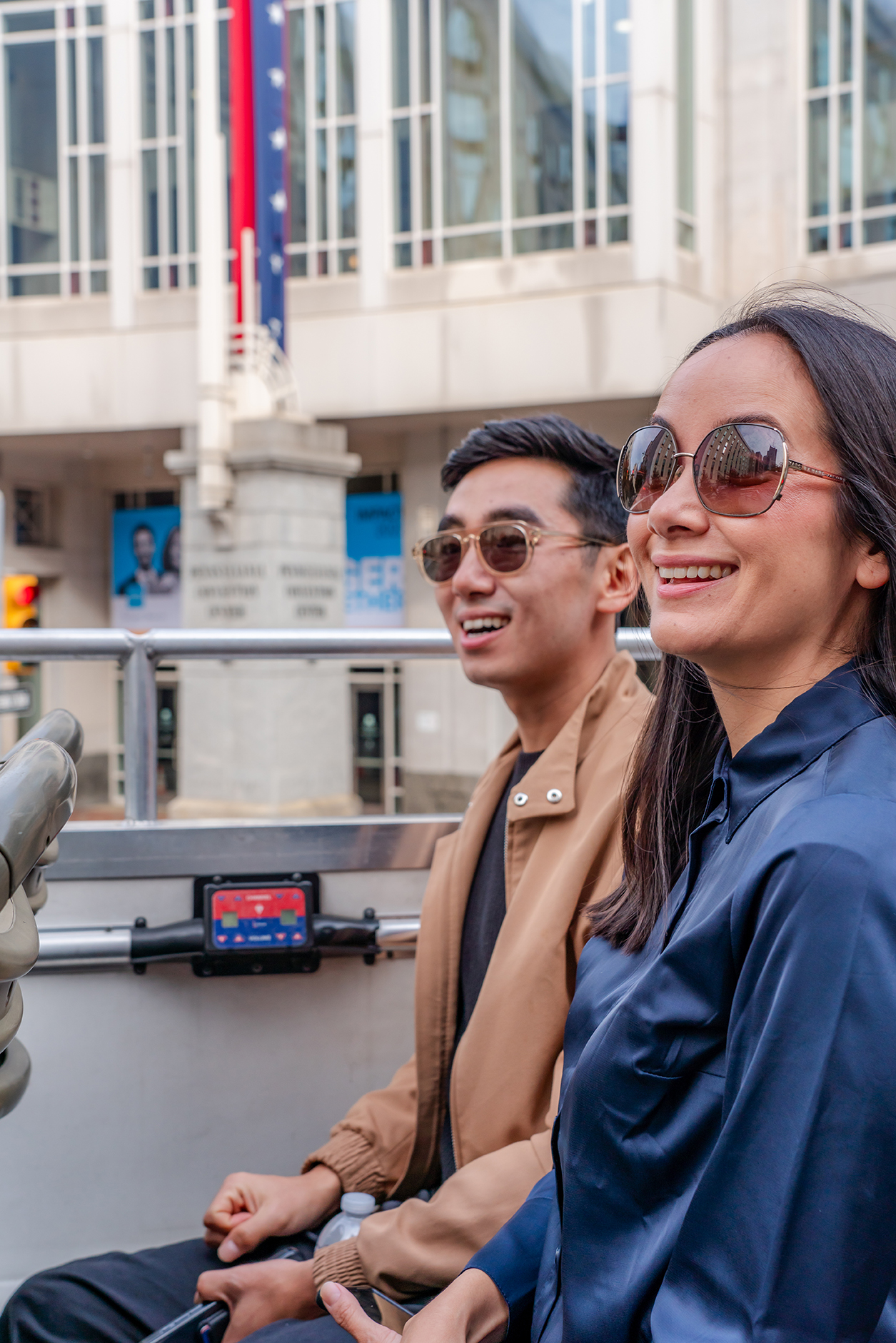 Two people on a tour bus in Philadelphia