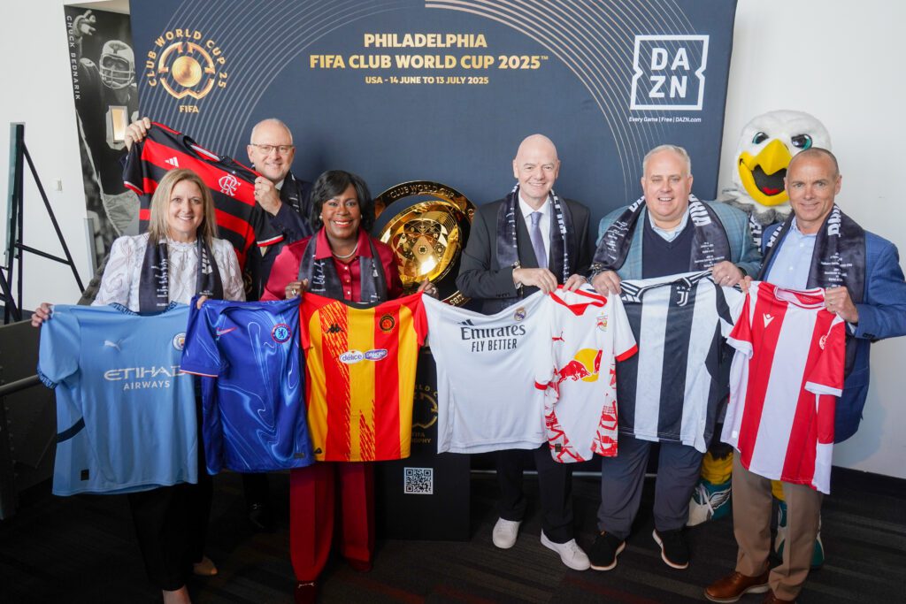 FIFA President Gianni Infantino with FIFA legend Youri Djorkaeff, Philadelphia Mayor Cherelle Parker, members of the PHLCVB, and Philadelphia Eagles President Don Smolenski in front of the FIFA Club World Cup trophy.