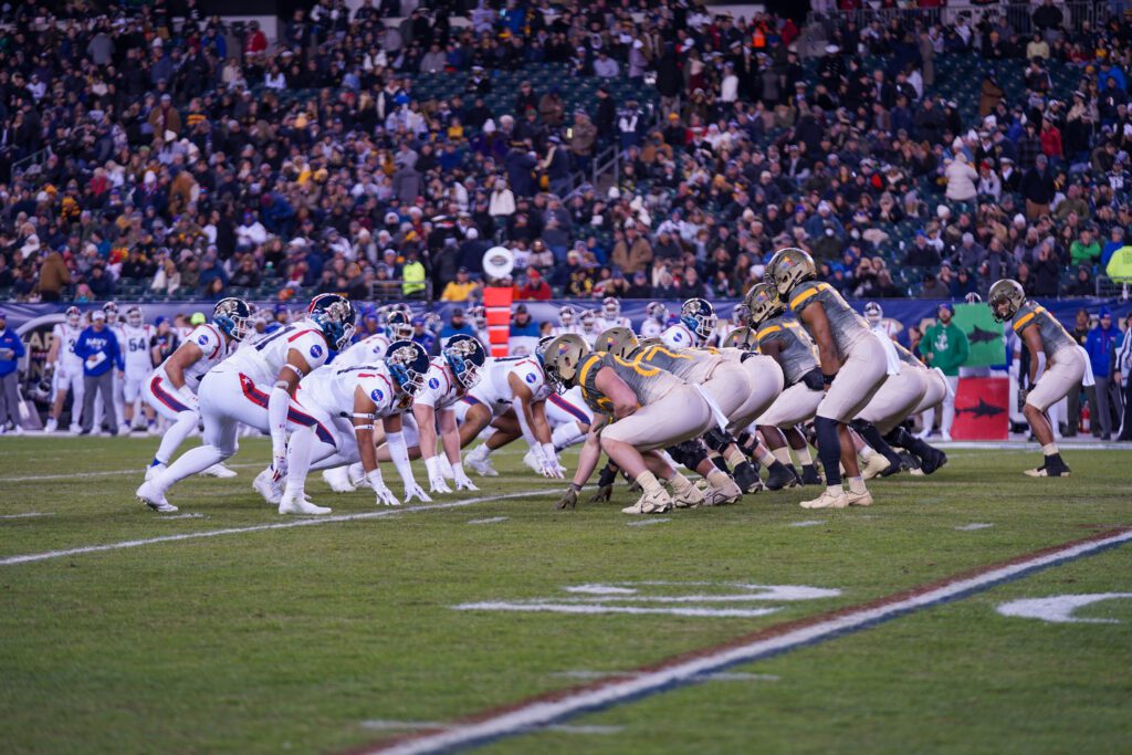 The Army and Navy football teams line up during the Army-Navy Game at Lincoln Financial Field.