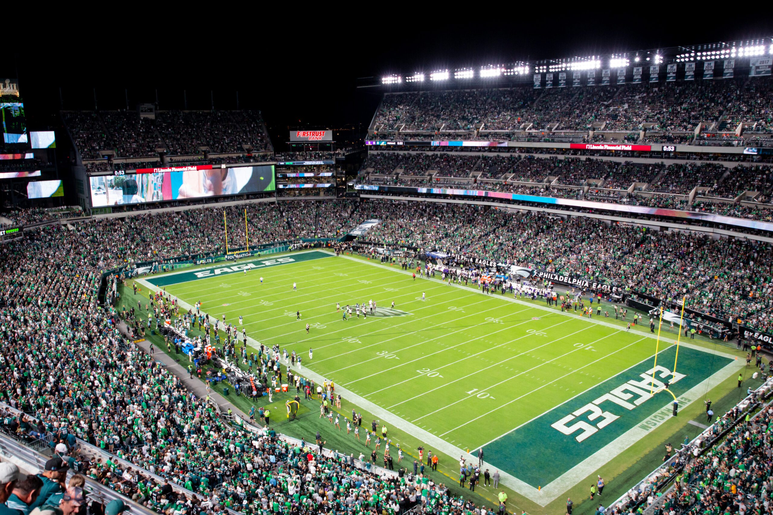 Lincoln Financial Field full of people at night.