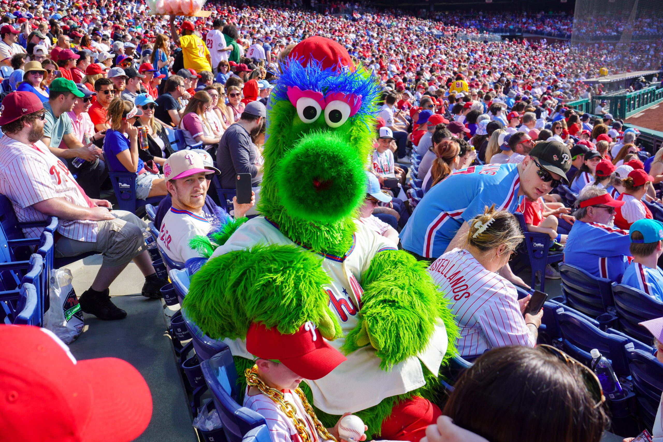 The Phillie Phanatic looking at the camera while sitting in the stands at Citizens Bank Park.