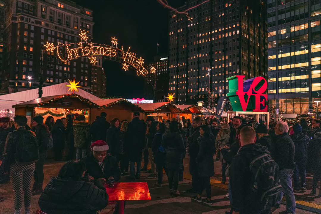 Christmas Village at night time in Love Park