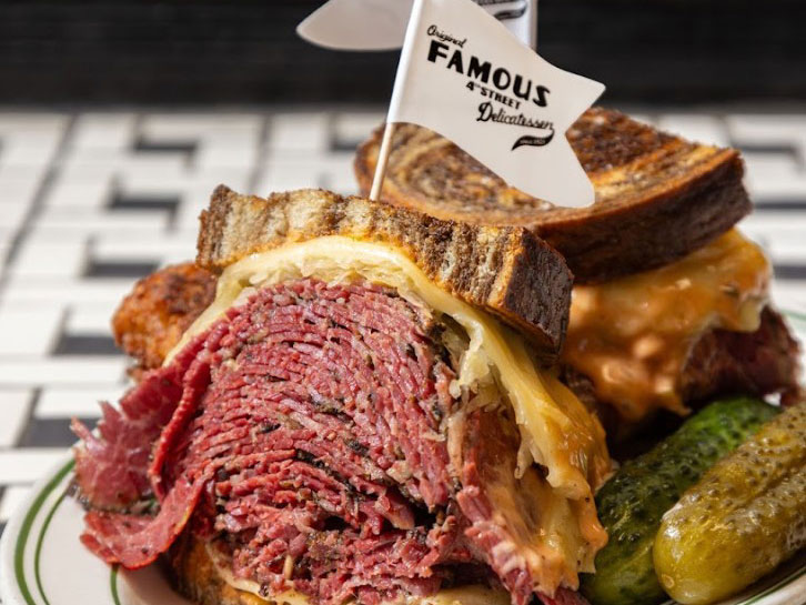 A stacked roast beef sandwich