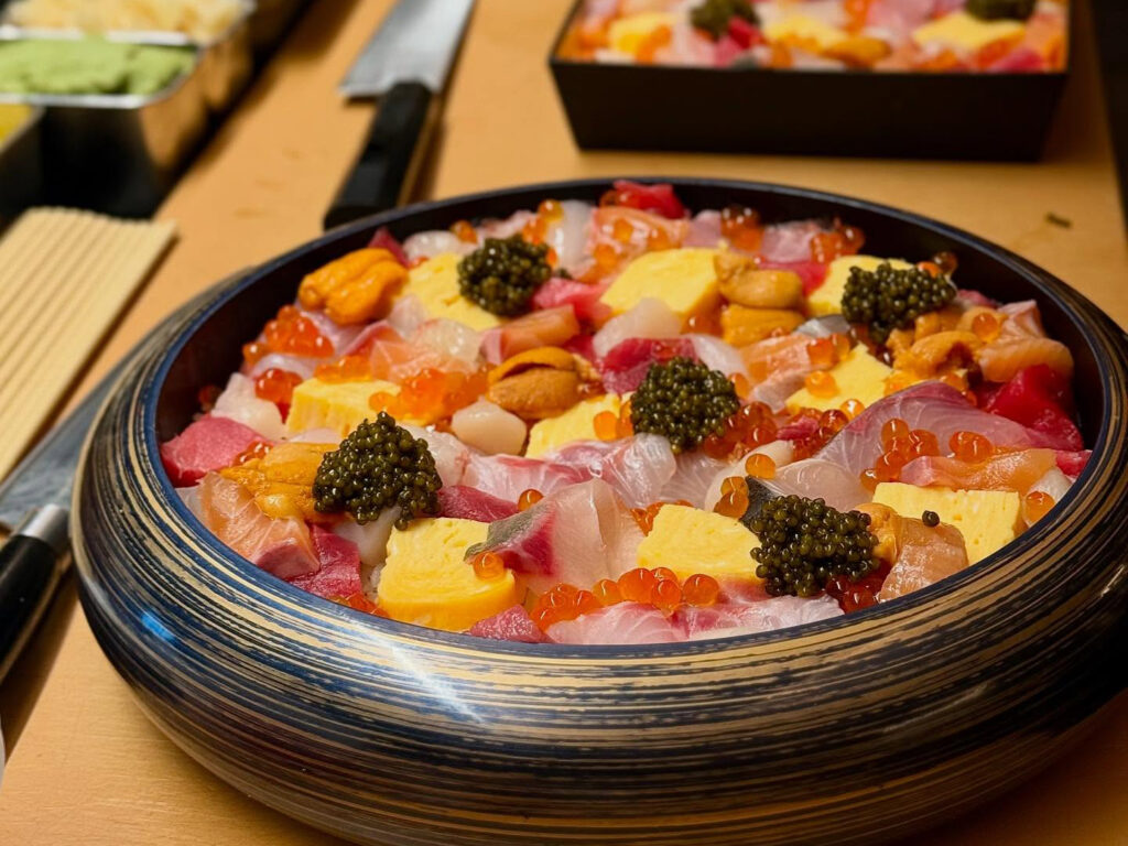 A bowl full of sushi