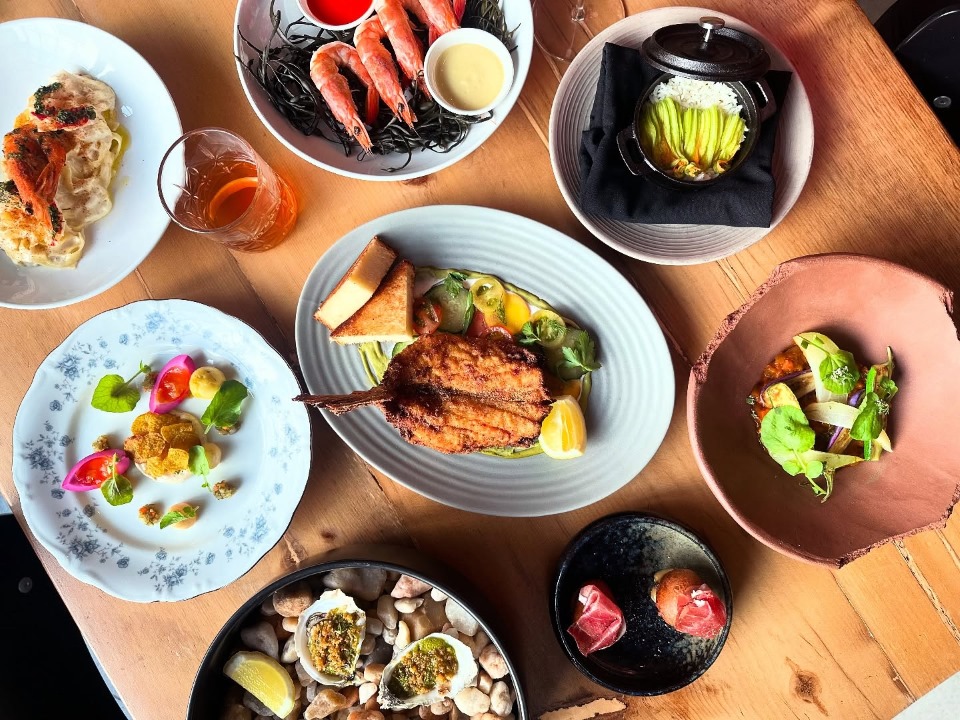 A table full of fine dining dishes