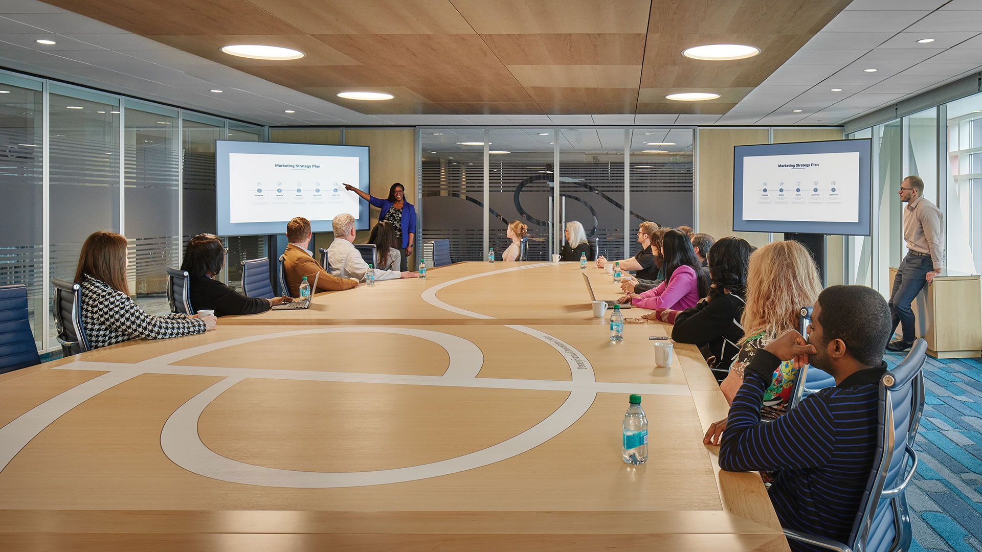A person points to a presention inside the Executive Board Room at the PA Convention Center